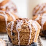 Glazed blueberry muffin on cooling rack