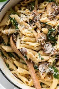 close up on mushroom pasta with cheese