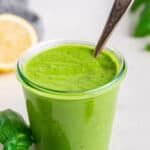 Jar of avocado green goddess dressing with spoon