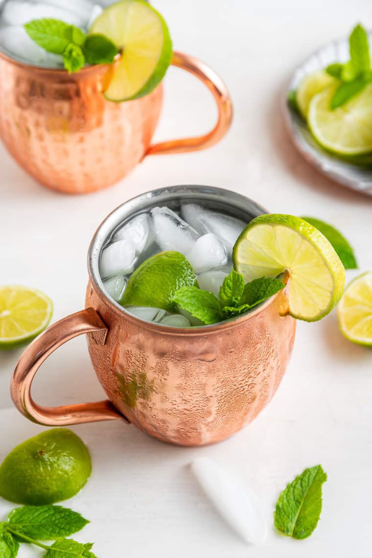 Mexican mule cocktails in 2 copper mugs