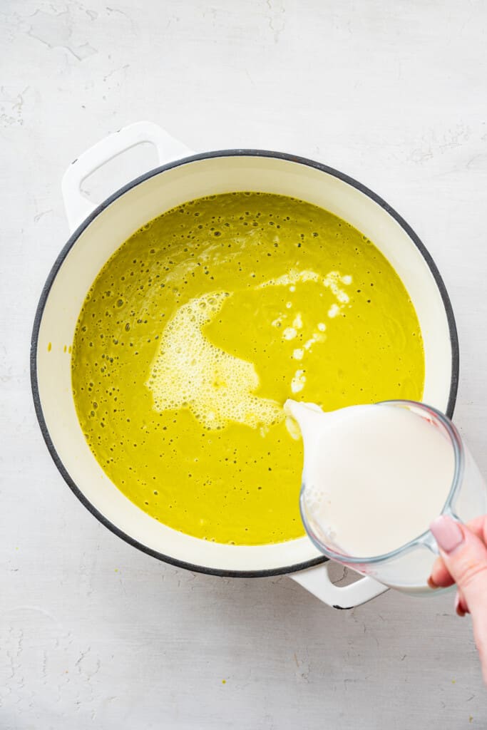 This creamy vegan broccoli soup is rich and silky without dairy. It's packed with savory veggies and ready in one pot in an hour or less! vegan creamy broccoli soup-13