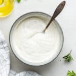 Overhead view of Greek yogurt dip in bowl with spoon