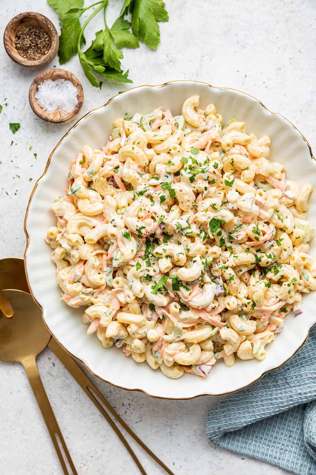 Overhead view of Hawaiian mac salad in serving bowl, garnished with parsley