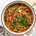 Vegetable lo mein in white Dutch oven