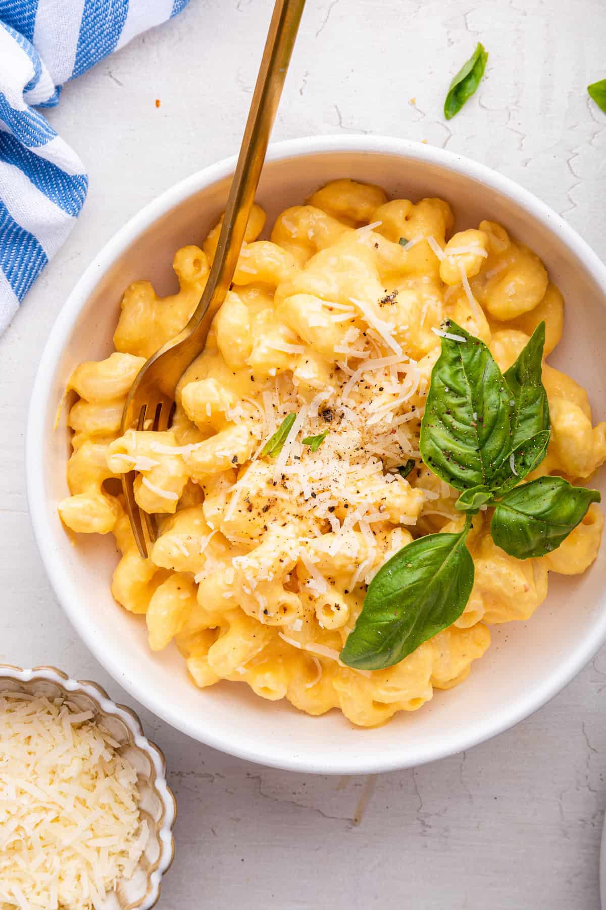 Overhead view of easy butternut squash mac and cheese in bowl with fork