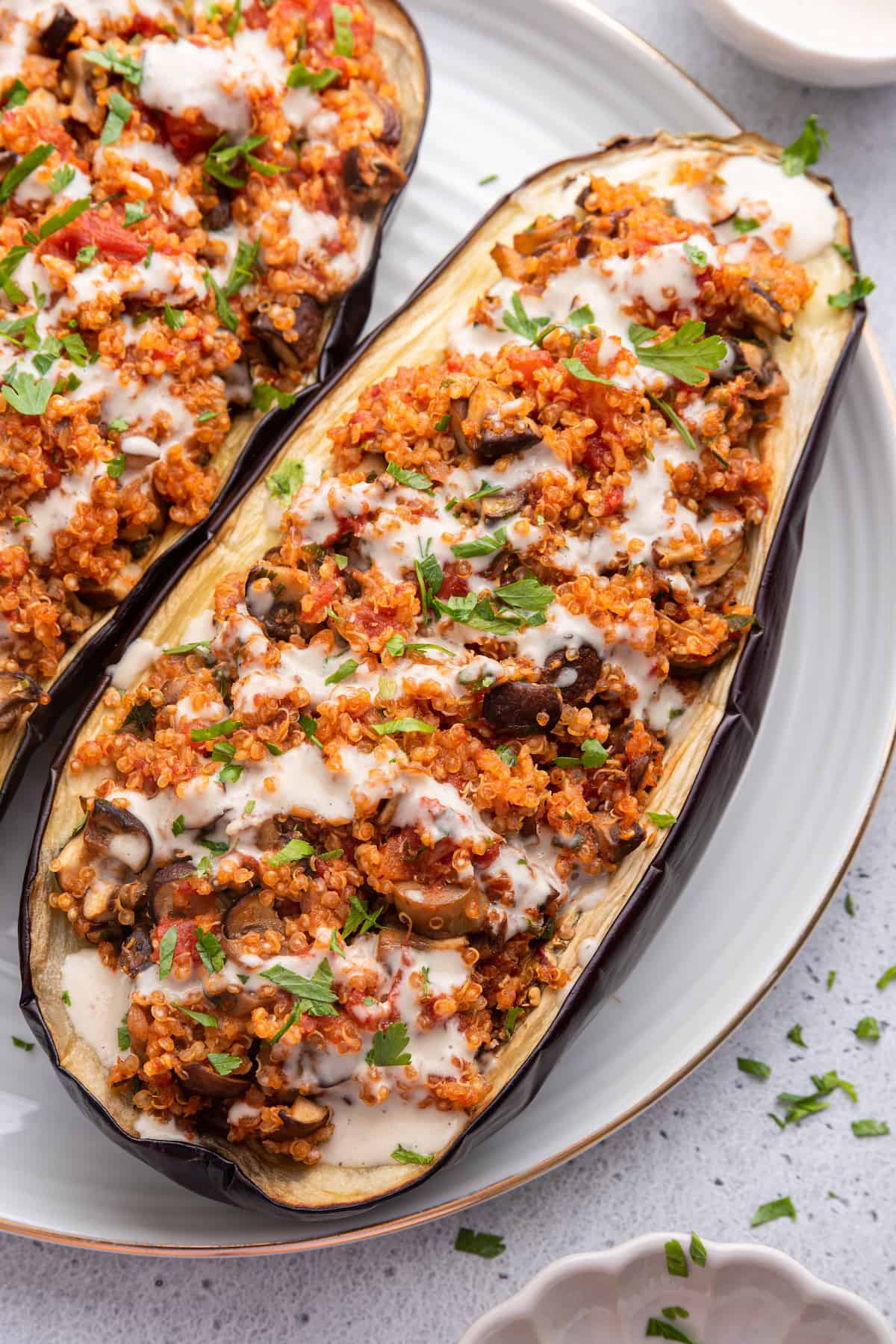 Eggplant stuffed with quinoa and vegetables on plate