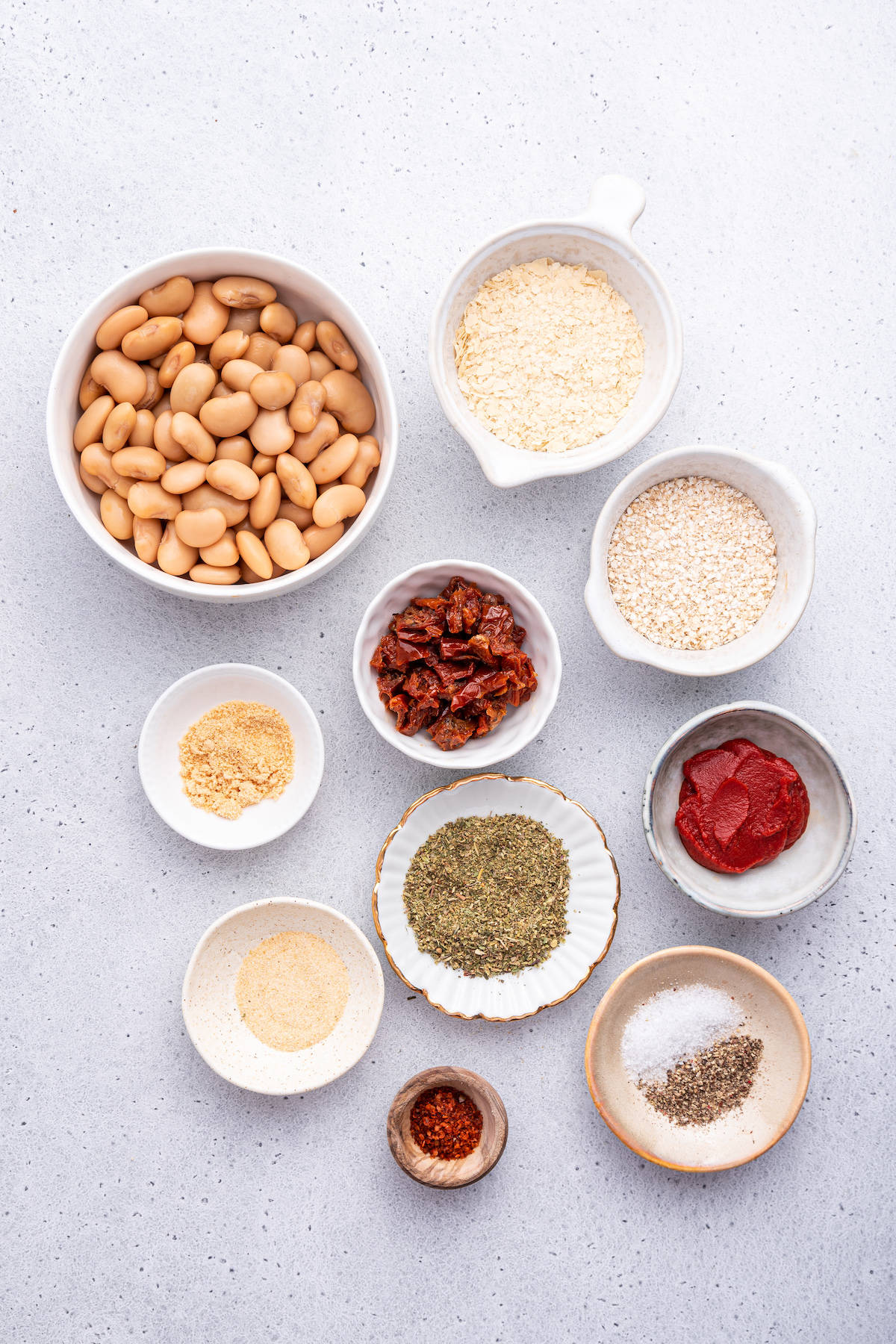 Overhead view of ingredients for vegan meatballs with white beans