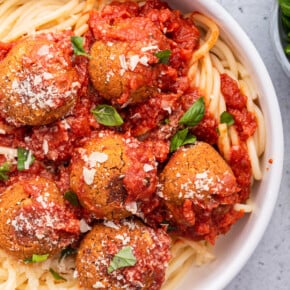 Overhead view of vegan meatballs and spaghetti in bowl