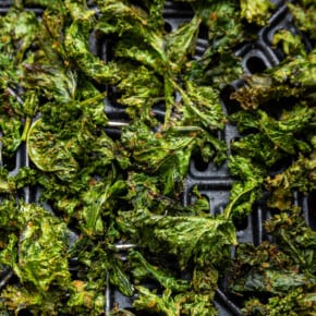 Kale chips in air fryer basket