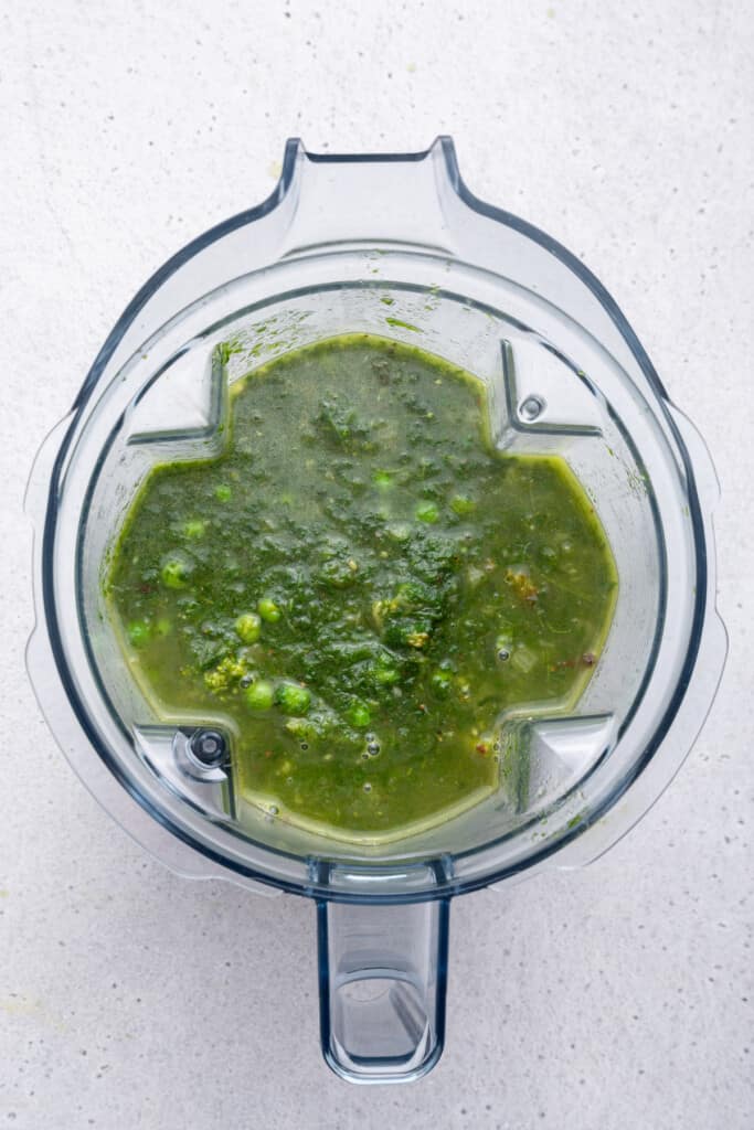 Overhead view of detox soup in blender before pureeing