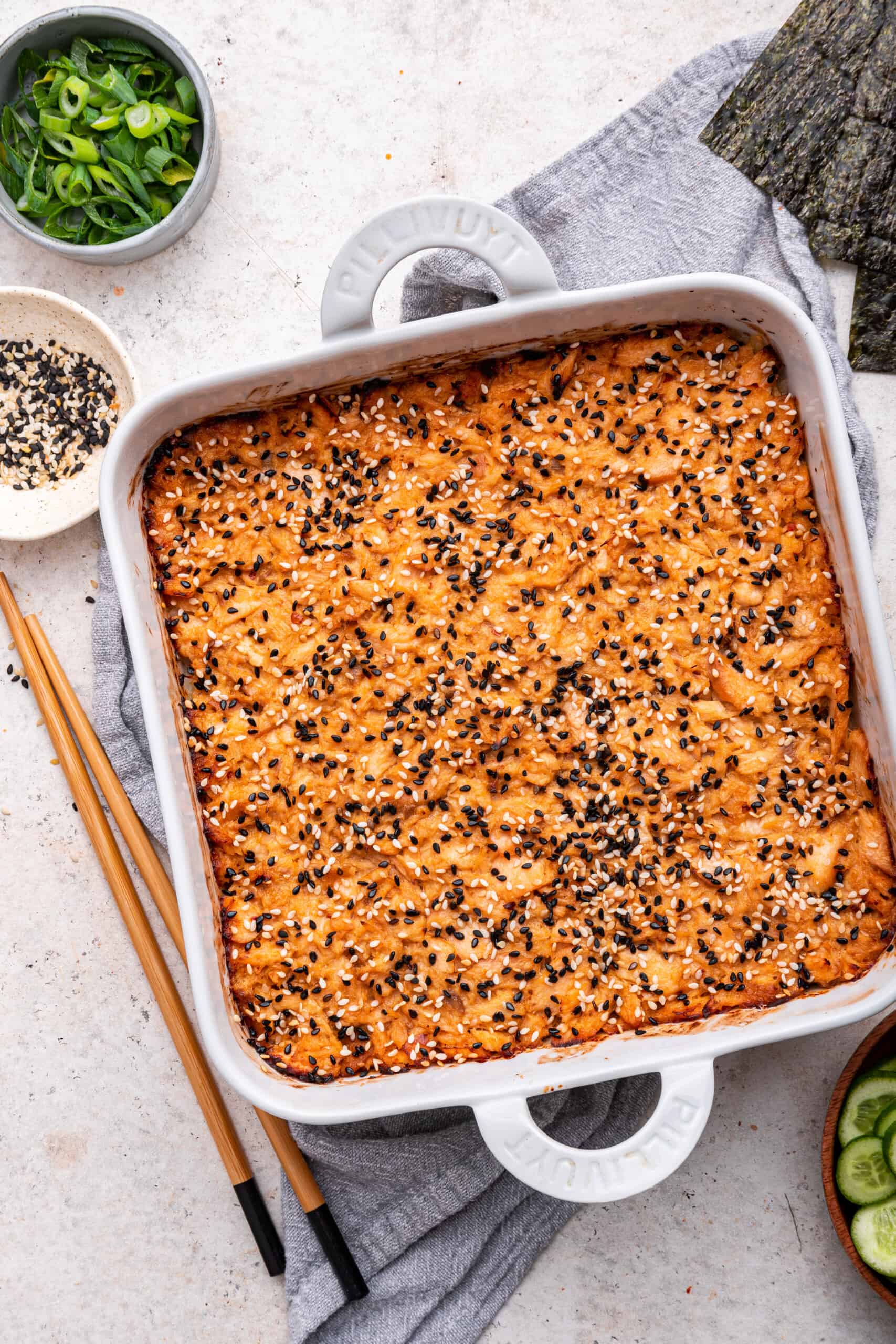 Overhead view of salmon sushi bake in baking dish