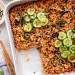 Overhead view of salmon sushi bake in baking dish