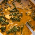 Big pot of vegan potato soup with ladle