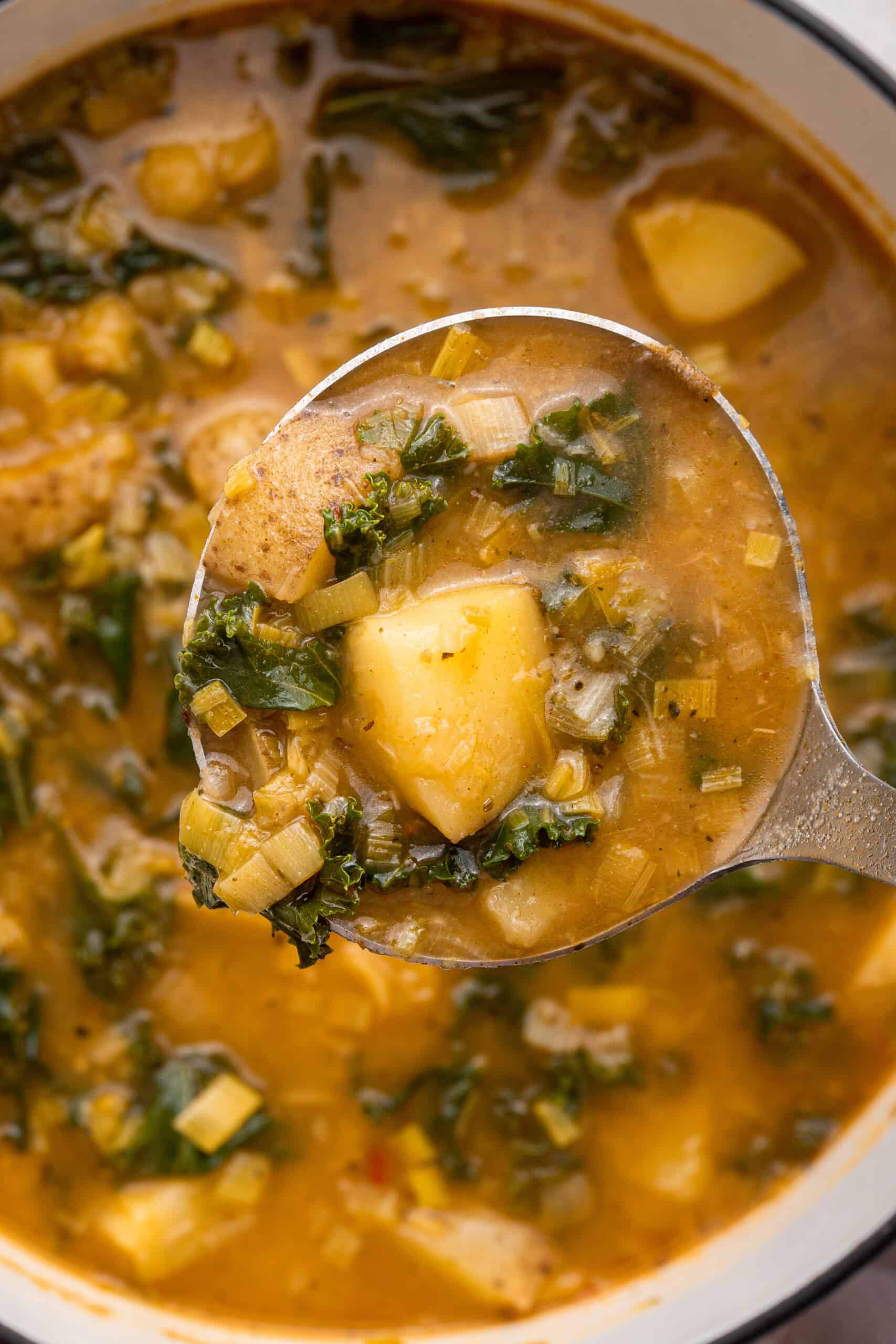 Ladle full of vegan potato soup