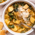 Bowl of vegan potato soup with spoon