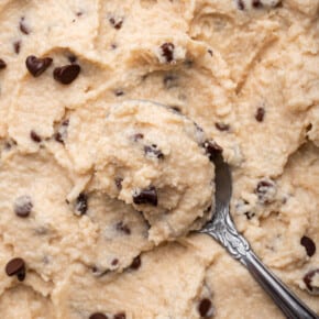 Bowl of chocolate chip cottage cheese cookie dough with spoon