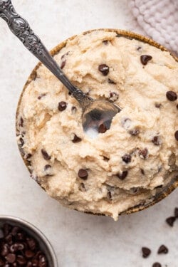 Overhead view of cottage cheese cookie dough in bowl with spoon