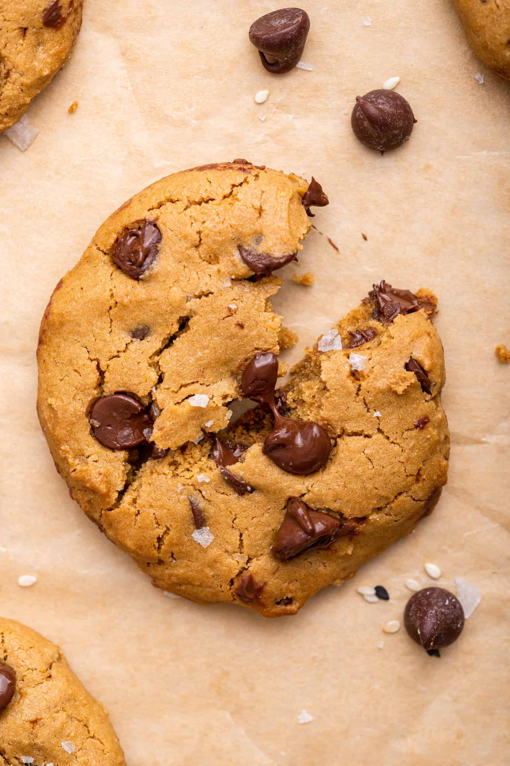 Overhead view of tahini chocolate chip cookie broken in half