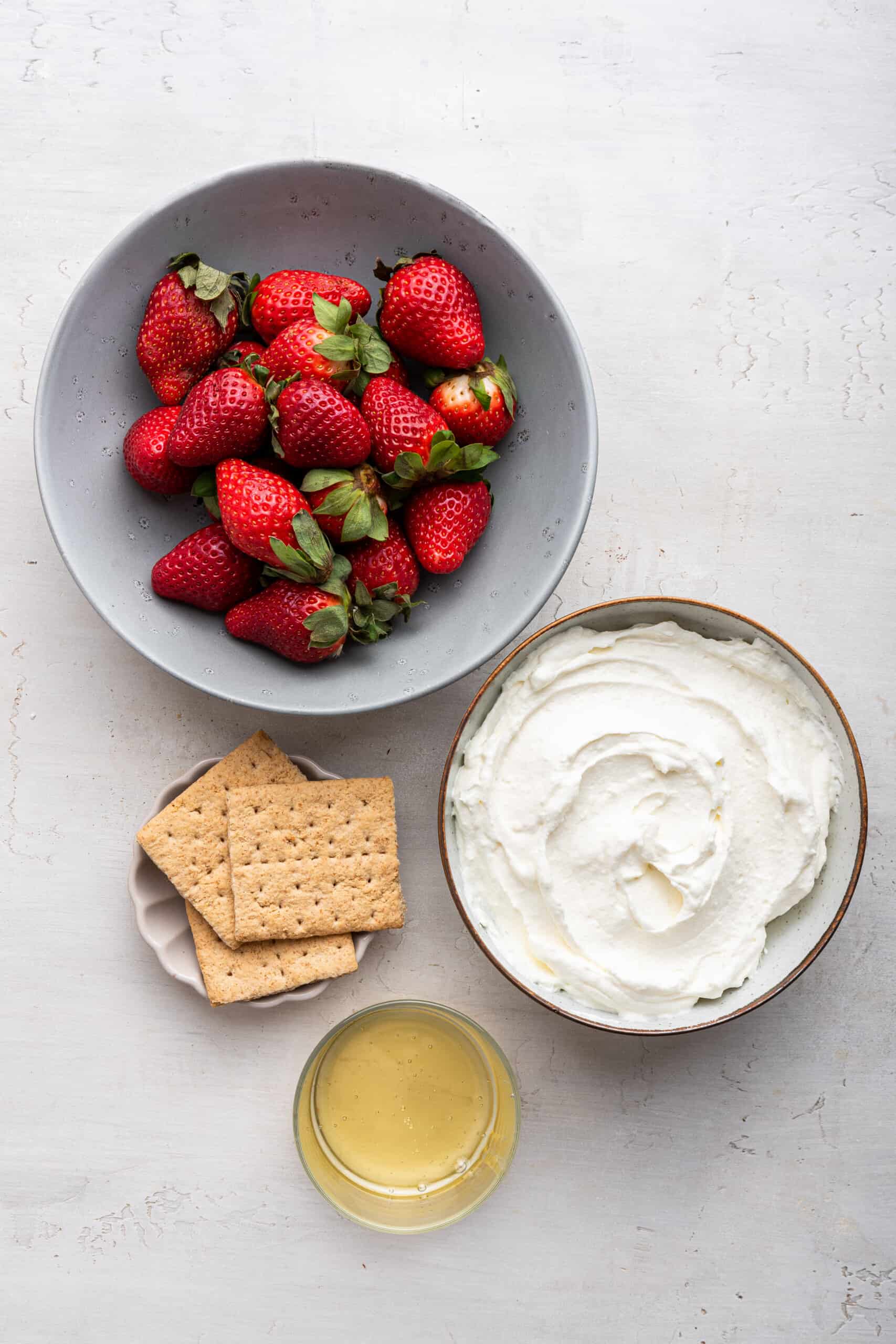 Overhead view of ingredients for lightened up deviled strawberries