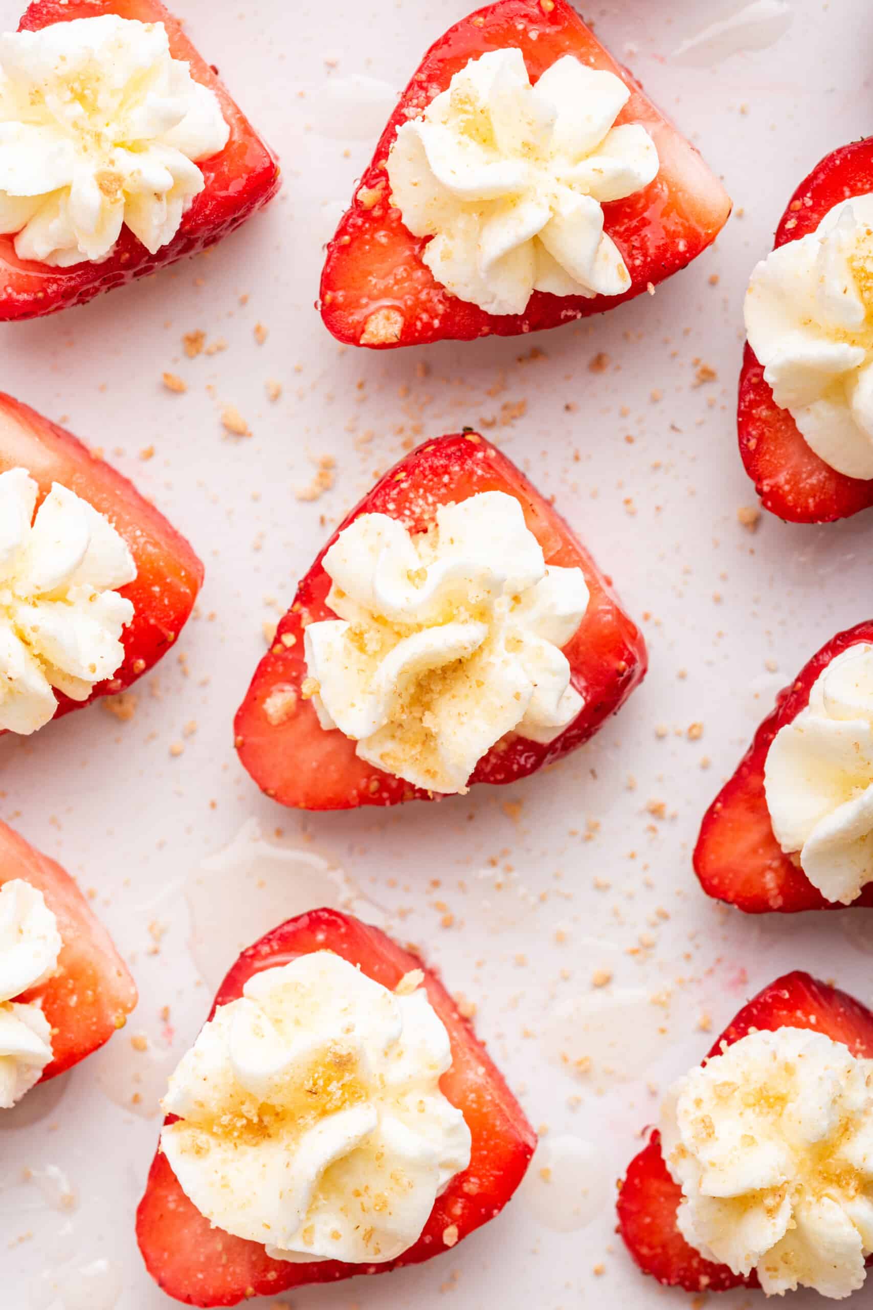 Overhead view of deviled strawberries with whipped cream
