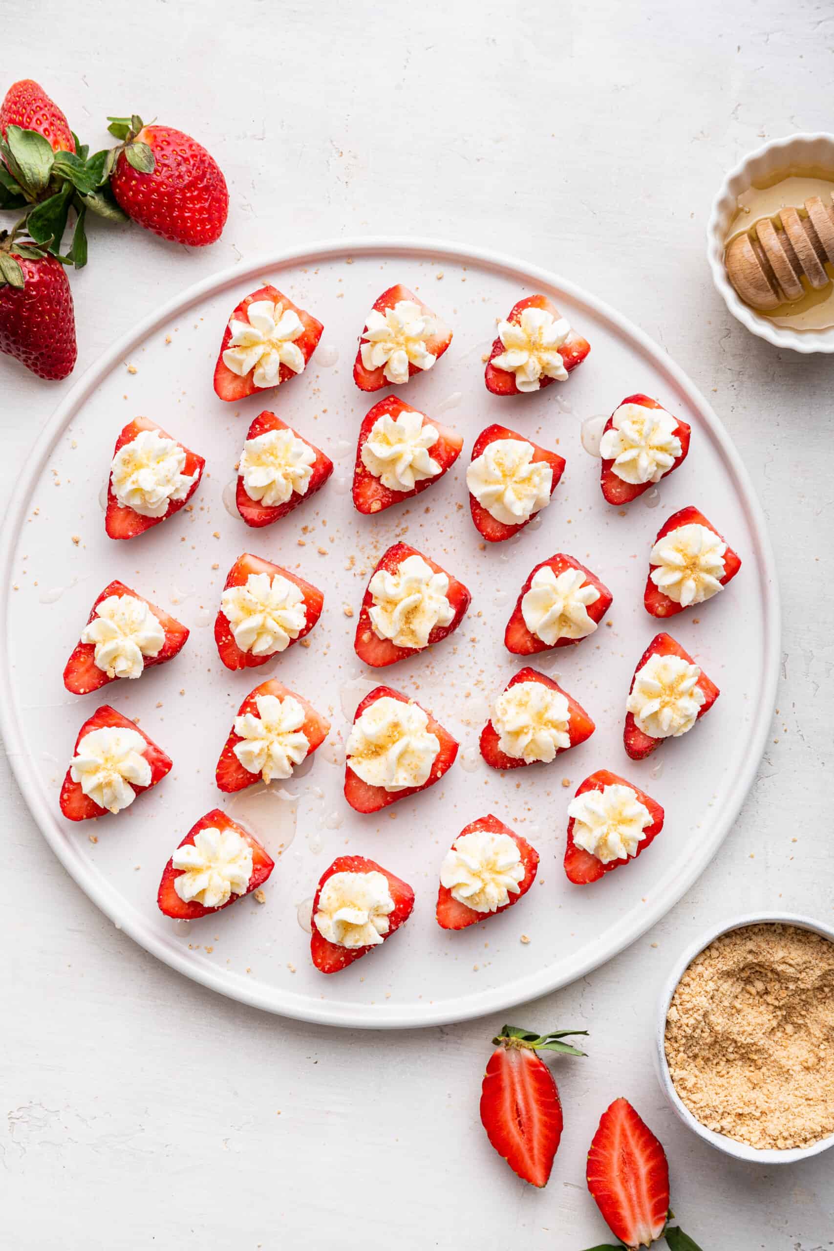 Overhead view of lightened up deviled strawberries on platter