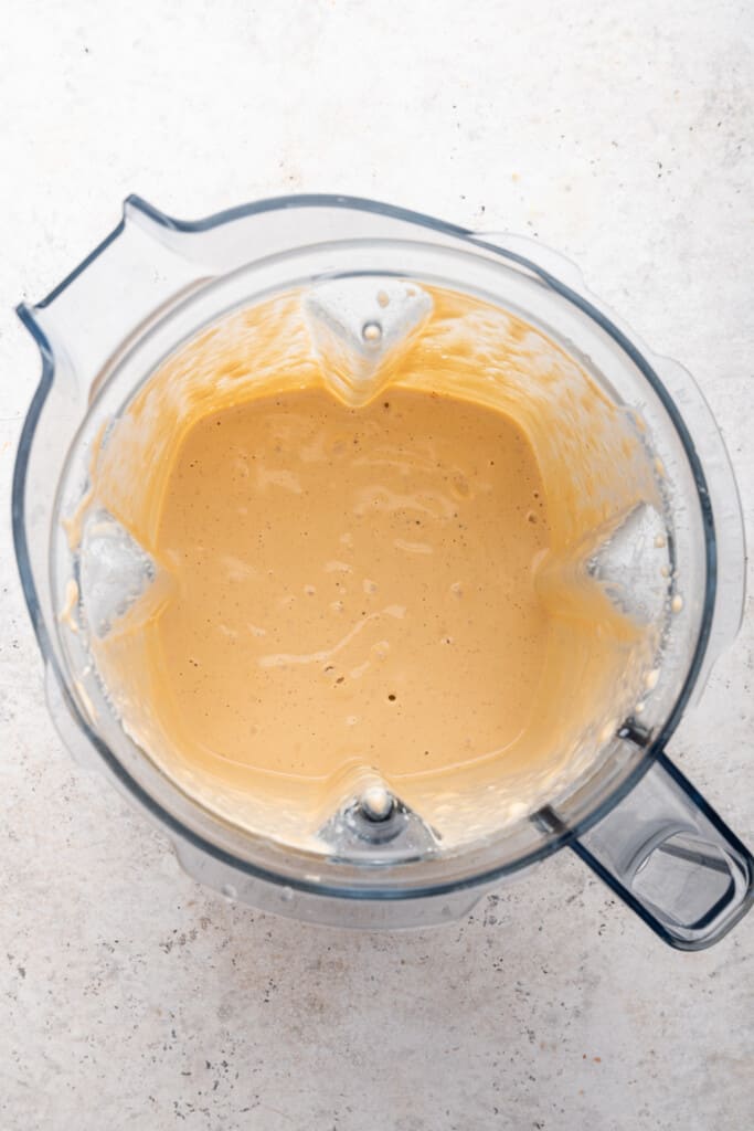 Overhead view of vegan queso in blender jar