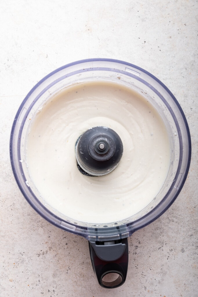 Overhead view of savory whipped cottage cheese in food processor