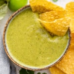 Tomatillo salsa in bowl with tortilla chips