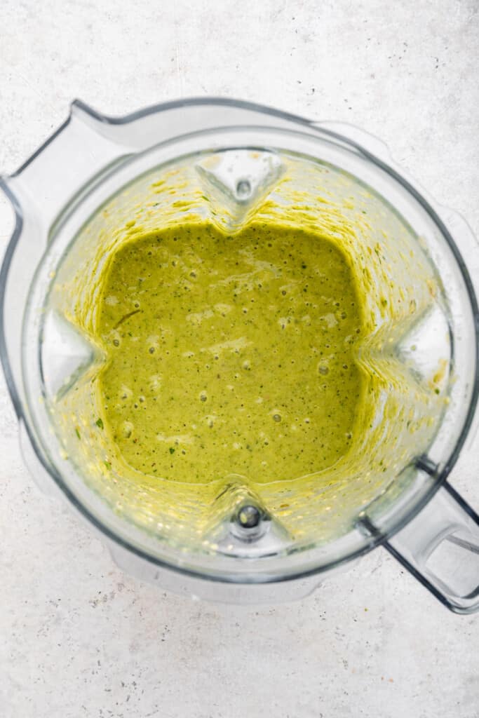Overhead view of tomatillo salsa in blender