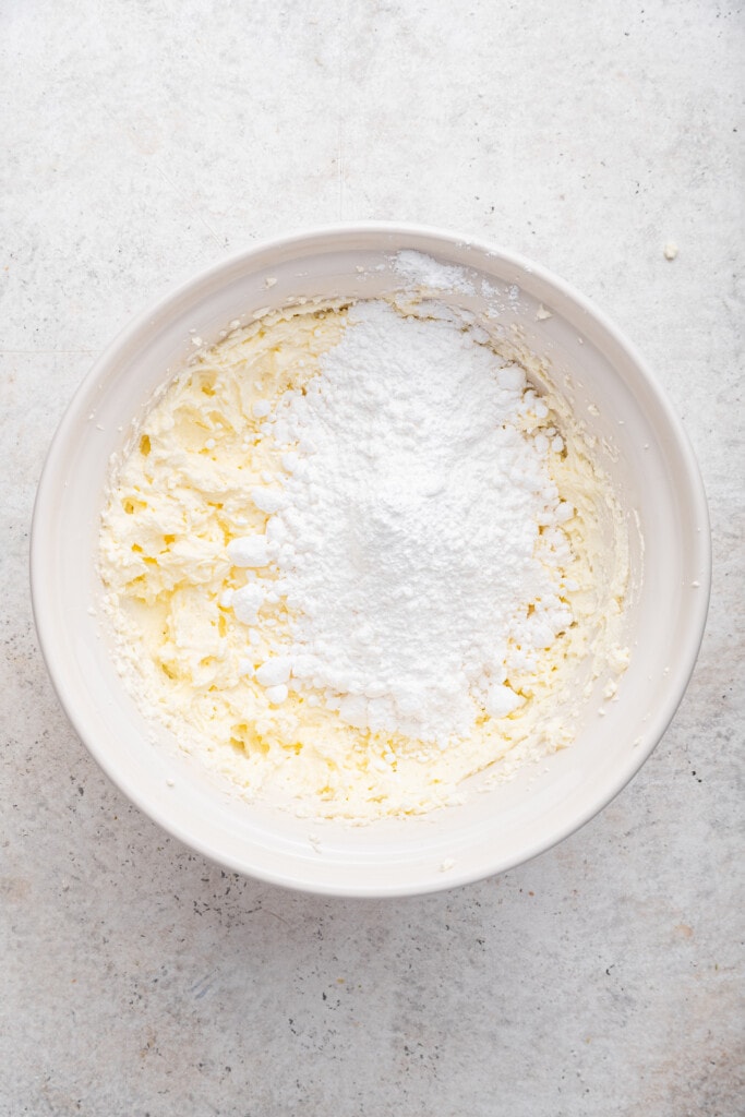 Powdered sugar added to bowl for frosting