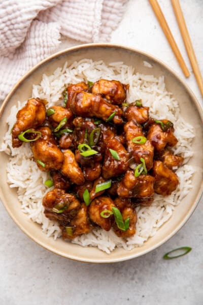 Overhead view of Mongolian chicken on plate with rice