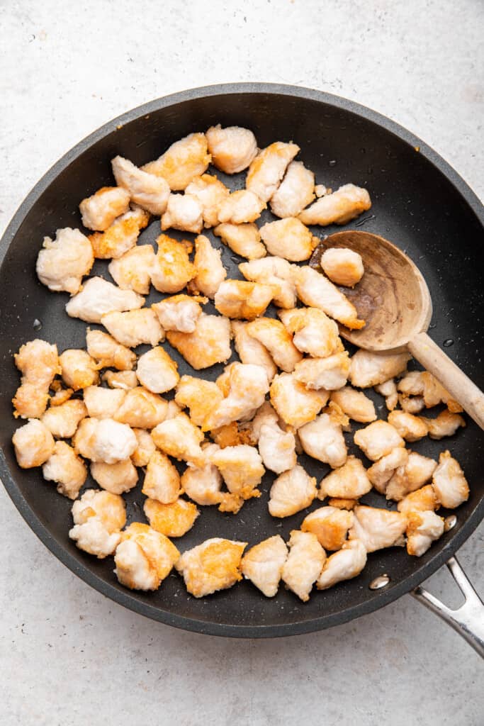 Overhead view of chicken in skillet