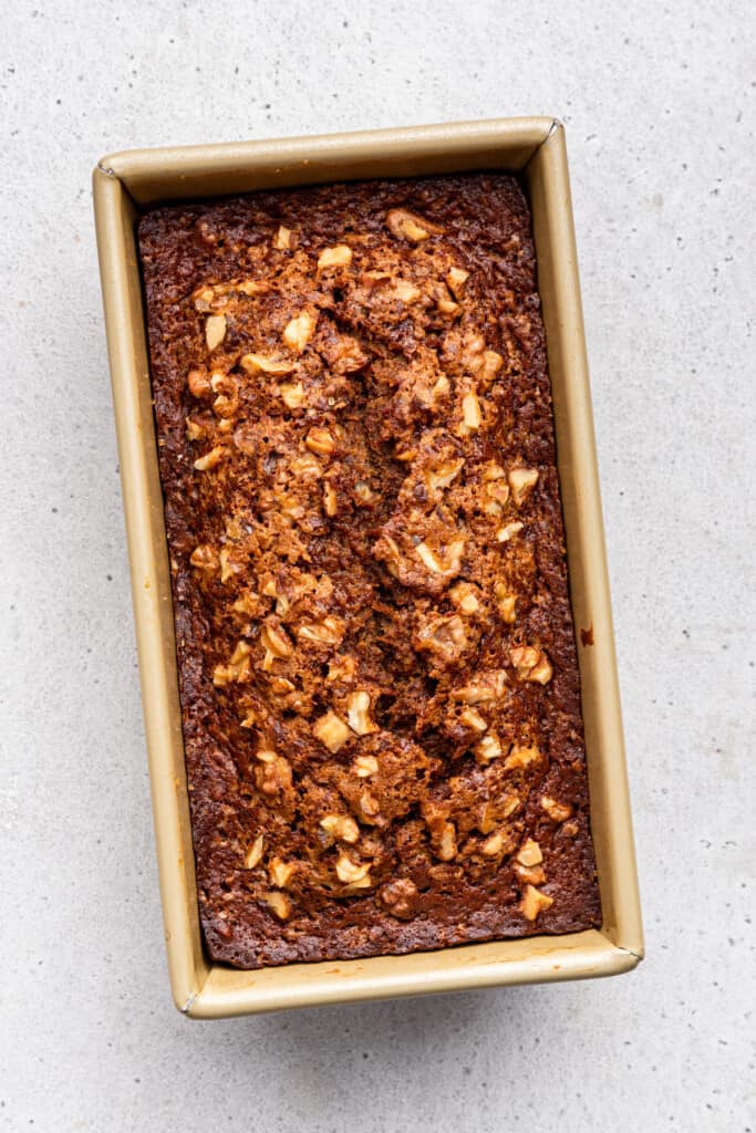 Overhead view of baked carrot banana bread in pan