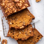 Overhead view of sliced gluten-free carrot bread with nuts