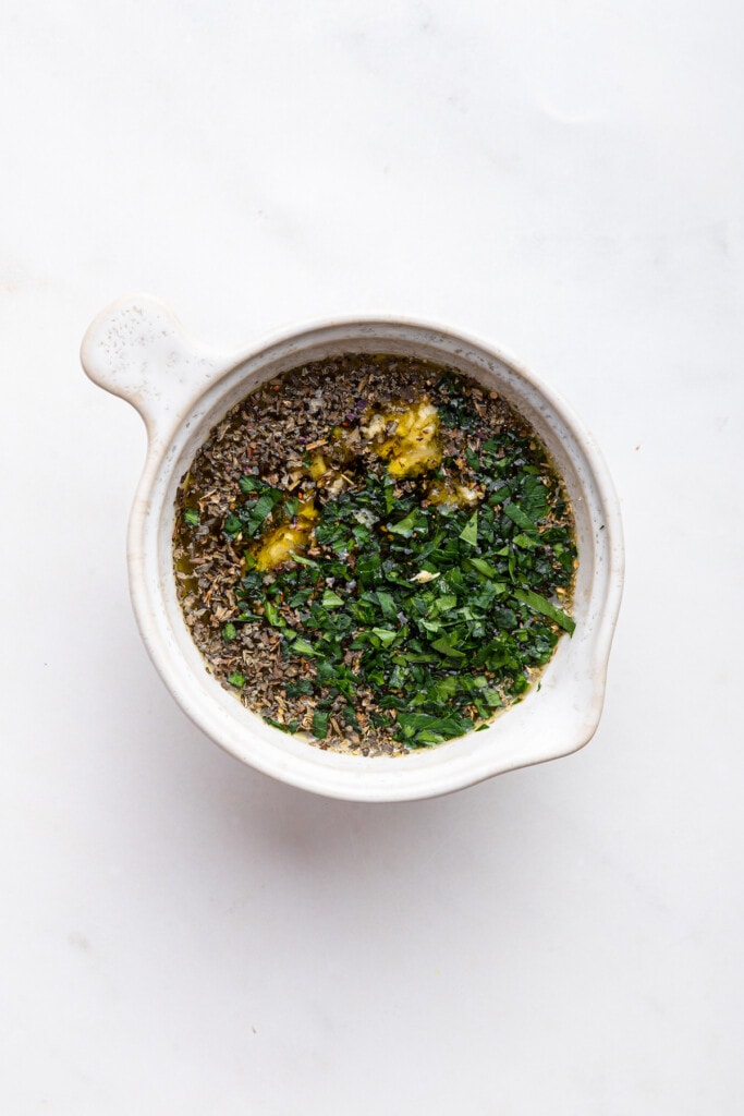 Ingredients for salad dressing in small bowl before mixing