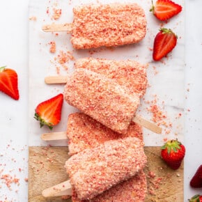 Overhead view of strawberry shortcake ice cream bars on board