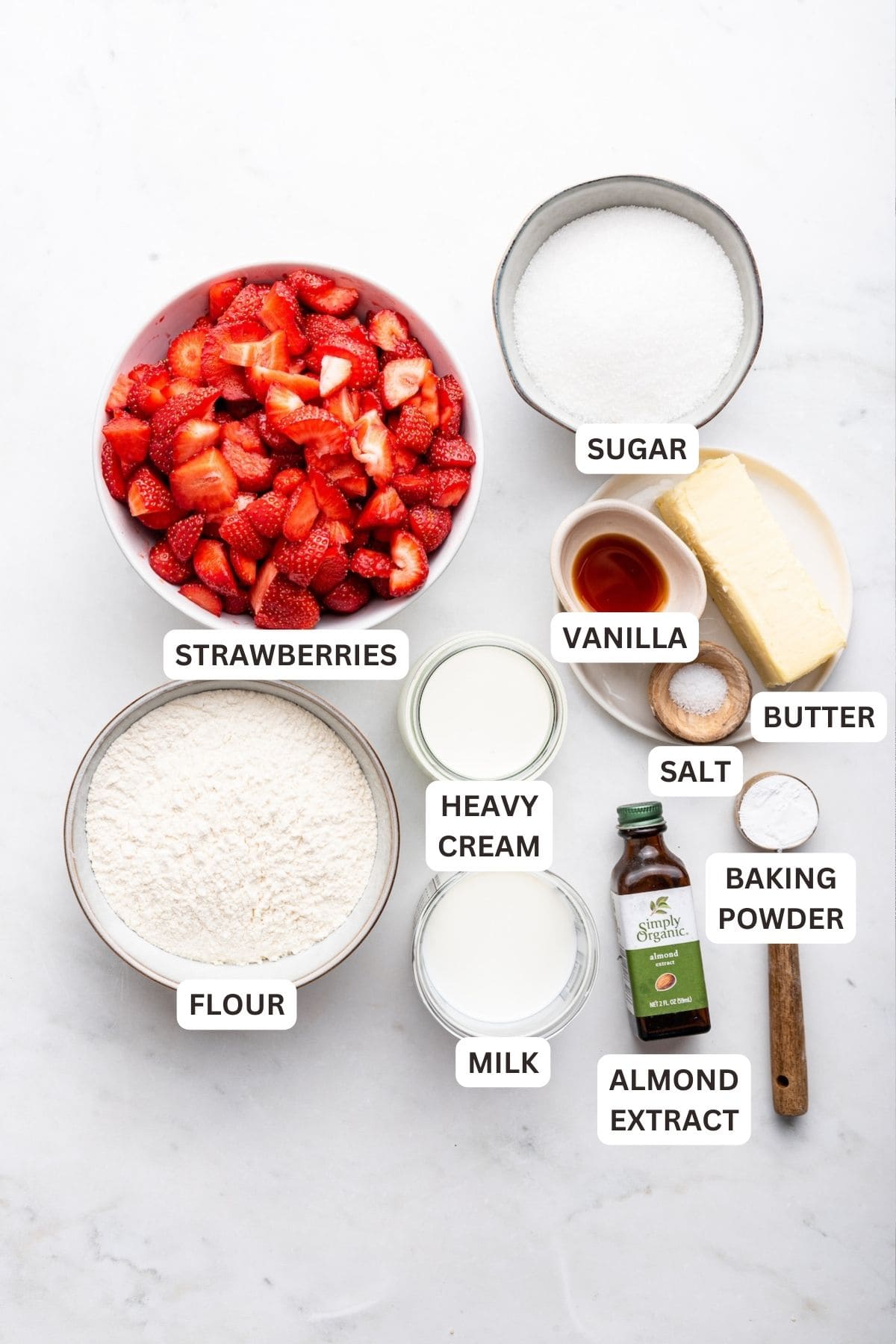 Overhead view of ingredients for strawberry cobbler