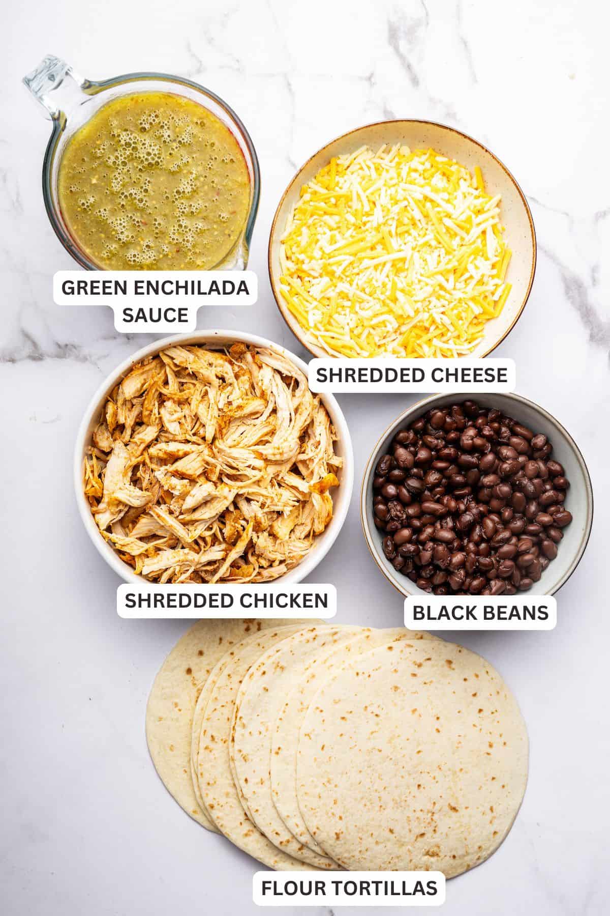 Overhead view of green chicken enchiladas with labels