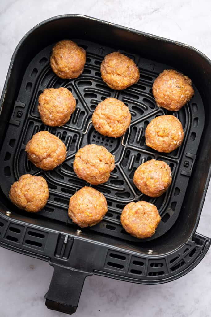 Turkey meatballs in air fryer before cooking