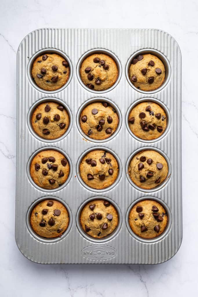Overhead view of banana protein muffins in pan