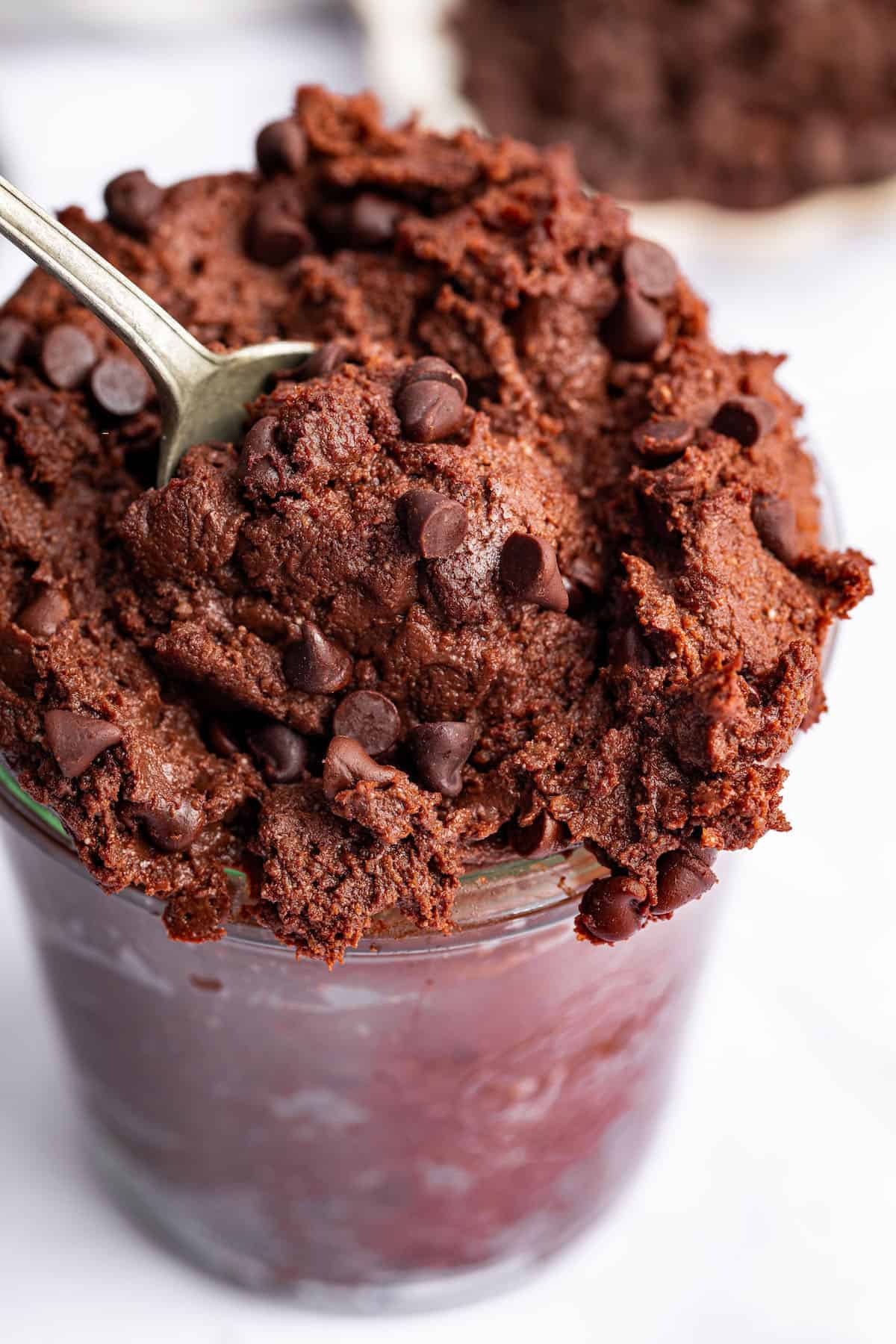Edible brownie batter overflowing in jar