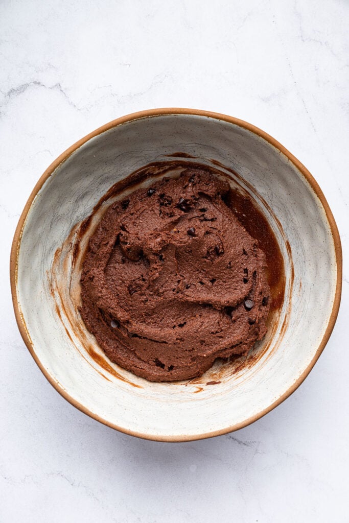 Overhead view of edible brownie batter in bowl