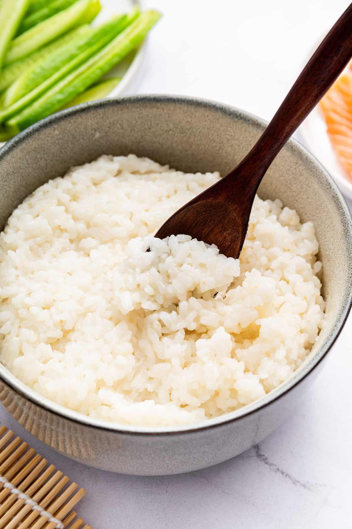 Bowl of Instant Pot sushi rice with spoon
