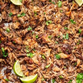 Overhead view of shredded Instant Pot carnitas on sheet pan