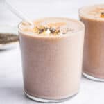 Two glasses with peanut butter banana smoothie