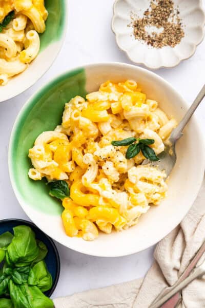 Overhead view of protein mac and cheese in bowl with fork