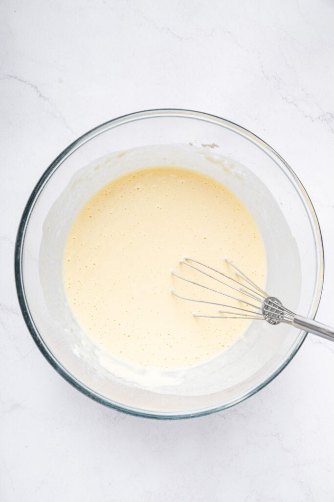 Bowl of tempura batter with whisk