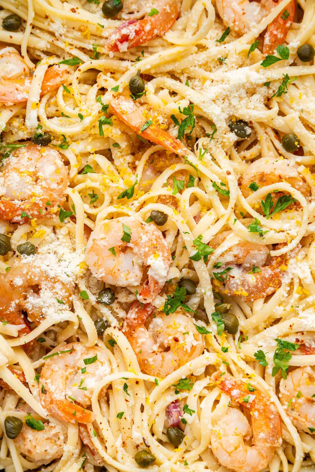 Overhead view of shrimp scampi with fettuccine noodles