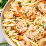Overhead view of easy shrimp scampi recipe in bowl with fork