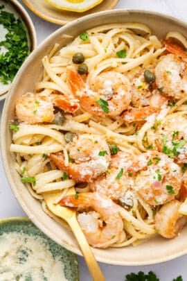 Overhead view of easy shrimp scampi recipe in bowl with fork